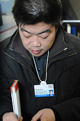 Feng Jun shows me his book scanner
